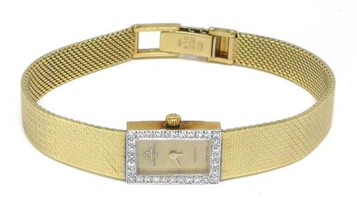 baume and mercier 18k gold watch