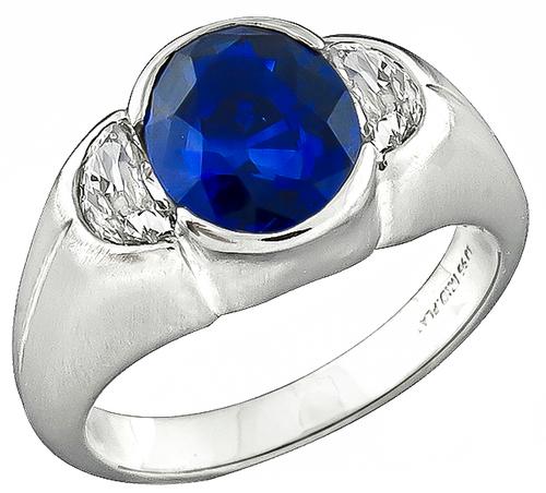 1920s 2.60ct Oval Cut Ceylon Sapphire 0.70ct Half Moon Old Mine Cut Diamond Platinum Ring 