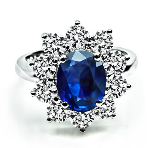 Oval Cut Sapphire Round Cut Diamond Platinum and 18k White Gold Engagement Ring