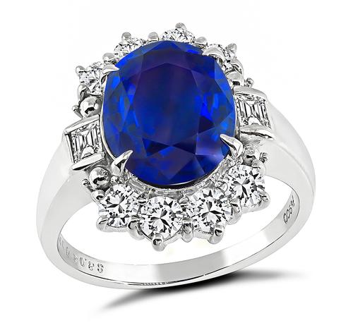 Oval Cut Sapphire Round and Baguette Cut Diamond Platinum Engagement Ring