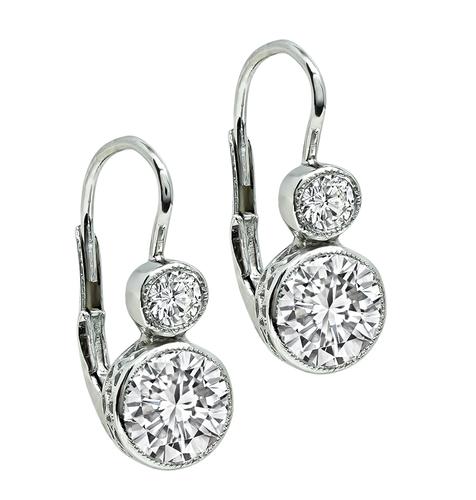 0.82ct and 0.86ct Round Cut Diamond Platinum Earrings