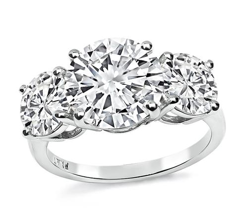 4.07cttw Round Cut Diamond Platinum Three Stone Ring