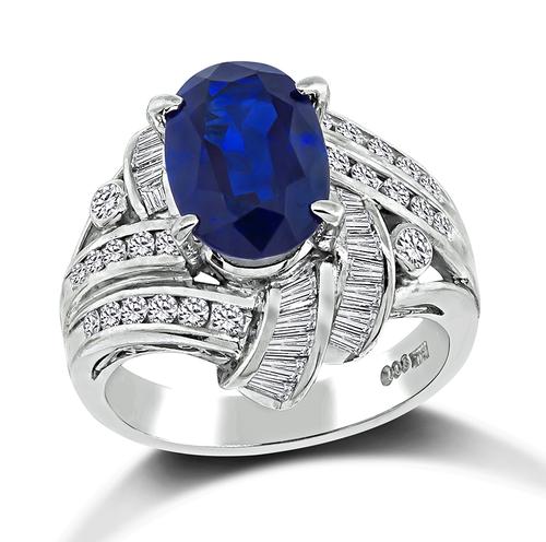 Oval Cut Sapphire Round and Baguette Cut Diamond Platinum Ring