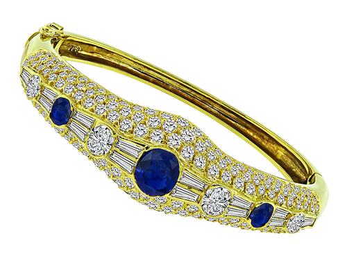 Oval Baguette and Round Cut Diamond Oval Cut Sapphire 18k Yellow Gold Bangle