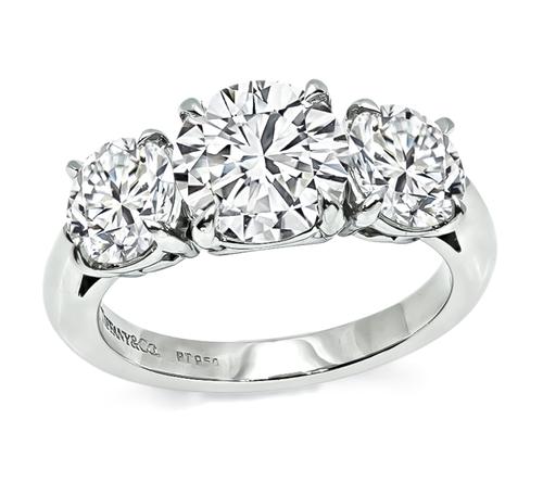 2.01ct Center Diamond 1.02ct and 1.00ct Round Cut Side Diamond Platinum Engagement Ring by Tiffany & Co