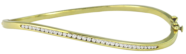 0.60ct diamond gold bangle photo 1