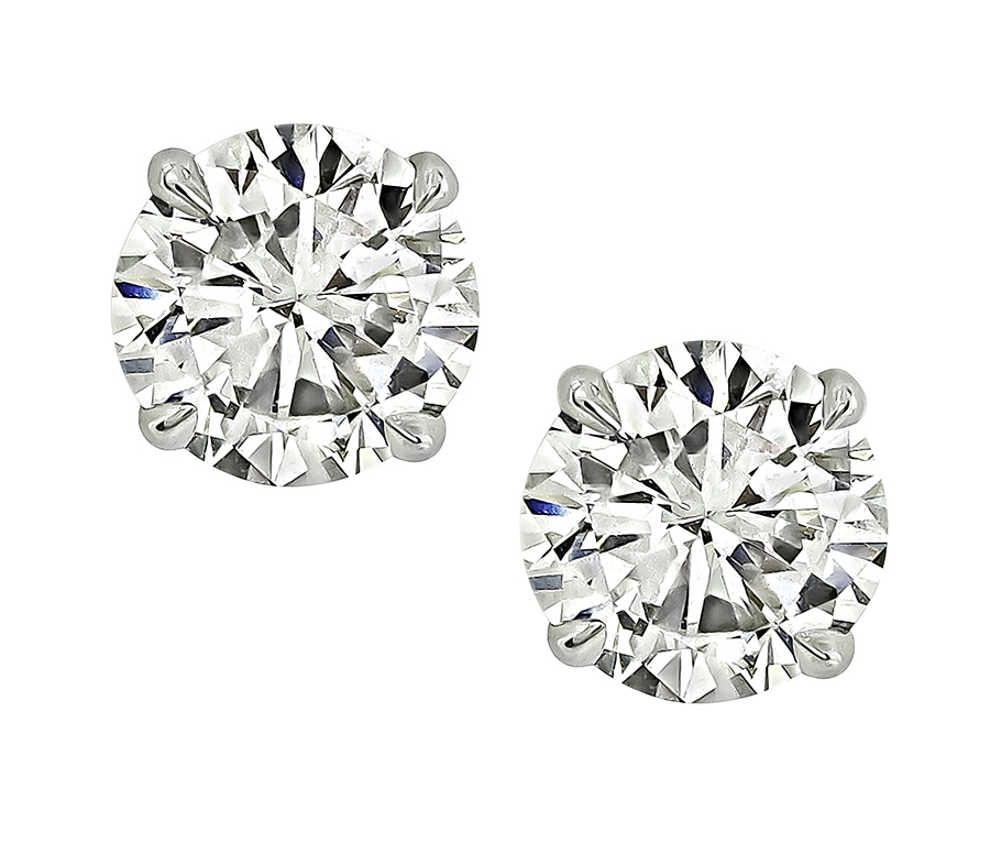Estate GIA Certified 0.56ct and 0.54ct Diamond Stud Earrings