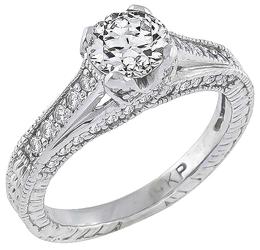 gia certified 0.69ct diamond engagement ring photo 1